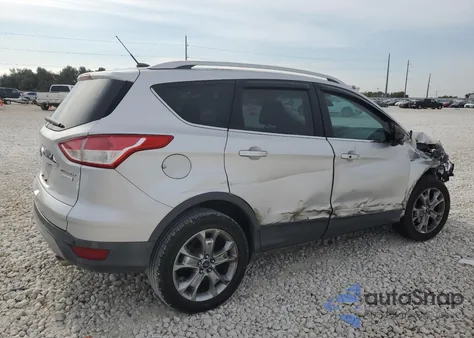 2014 Ford Escape Titanium z USA, uszkodzony, nr VIN 1FMCU0JX7EUE21660